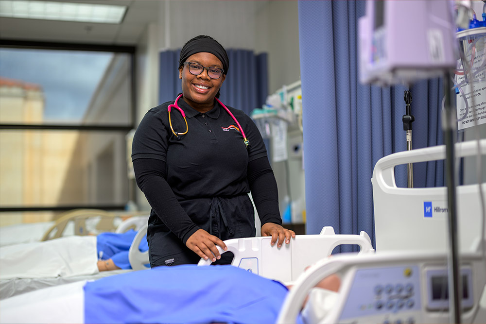 alencia College nursing student Aneka Reid in patient room during clinical training