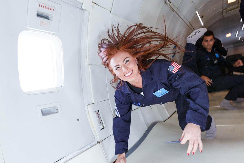 Jillian floating in a zero gravity airplane