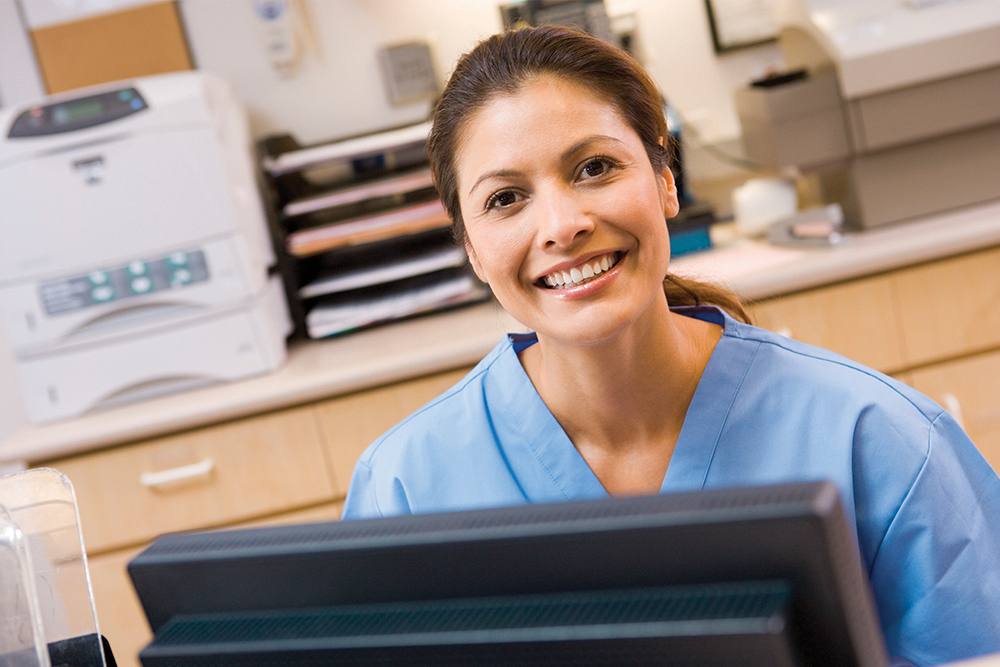 Health Information Technology student at computer