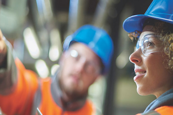 Students walking out of door