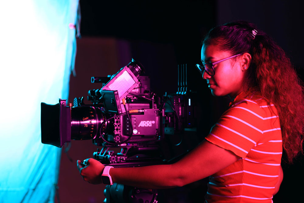 Film Production Technology female student with camera