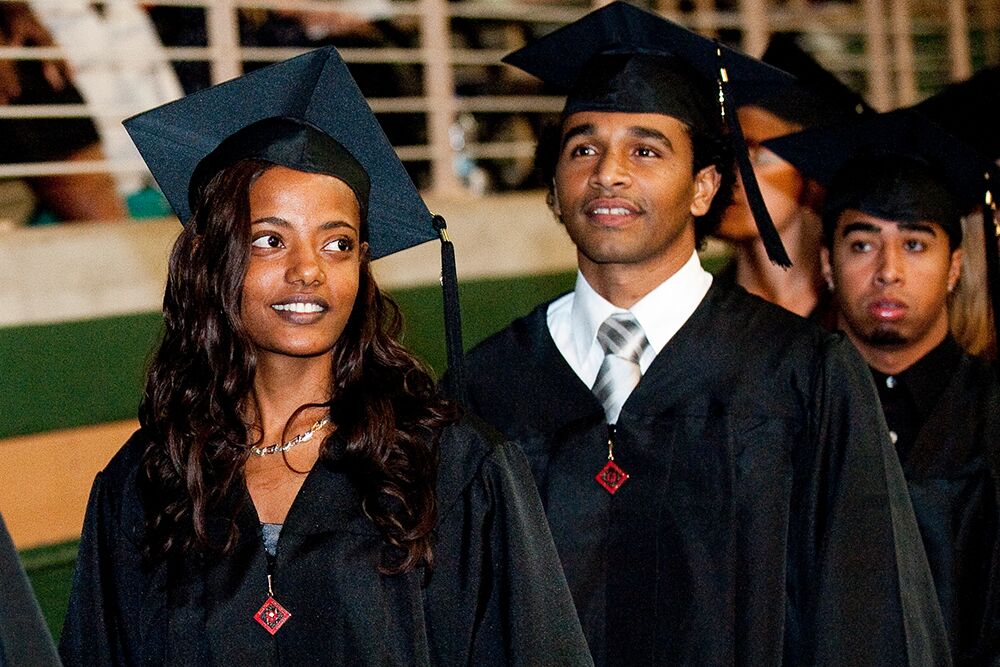 Commencement students walking at graduation ceremony